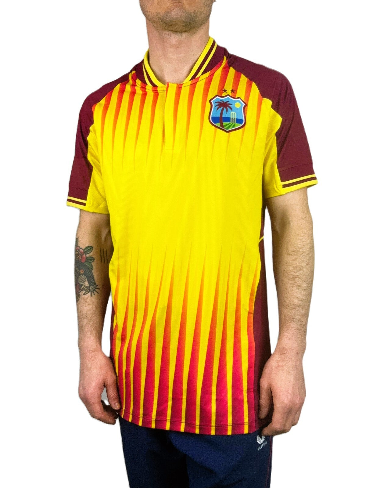 Castore Mens West Indies T20 SS Cricket Top / Yellow Maroon / RRP £60