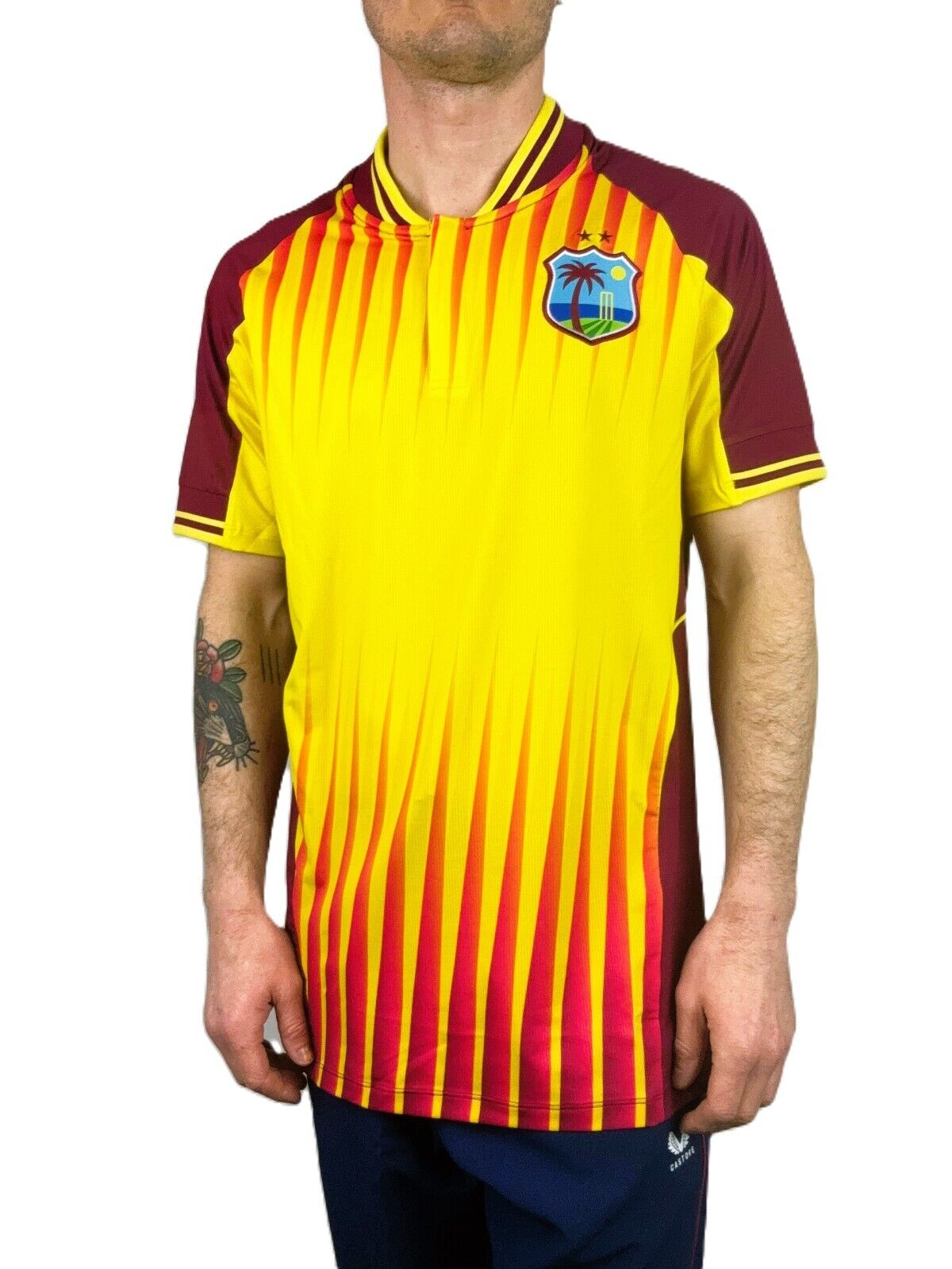 Castore Mens West Indies T20 SS Cricket Top / Yellow Maroon / RRP £60