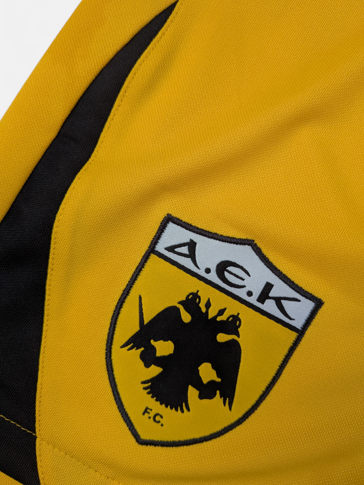 PUMA Mens 2011-12 AEK Athens Home Football Shorts / BNWT / Yellow / RRP £25