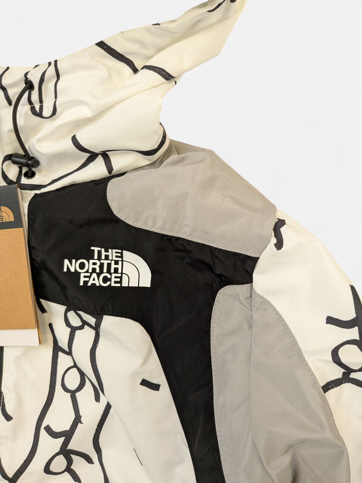 The North Face Womens Black Box Search & Rescue Wind Jacket / White/ RRP £140