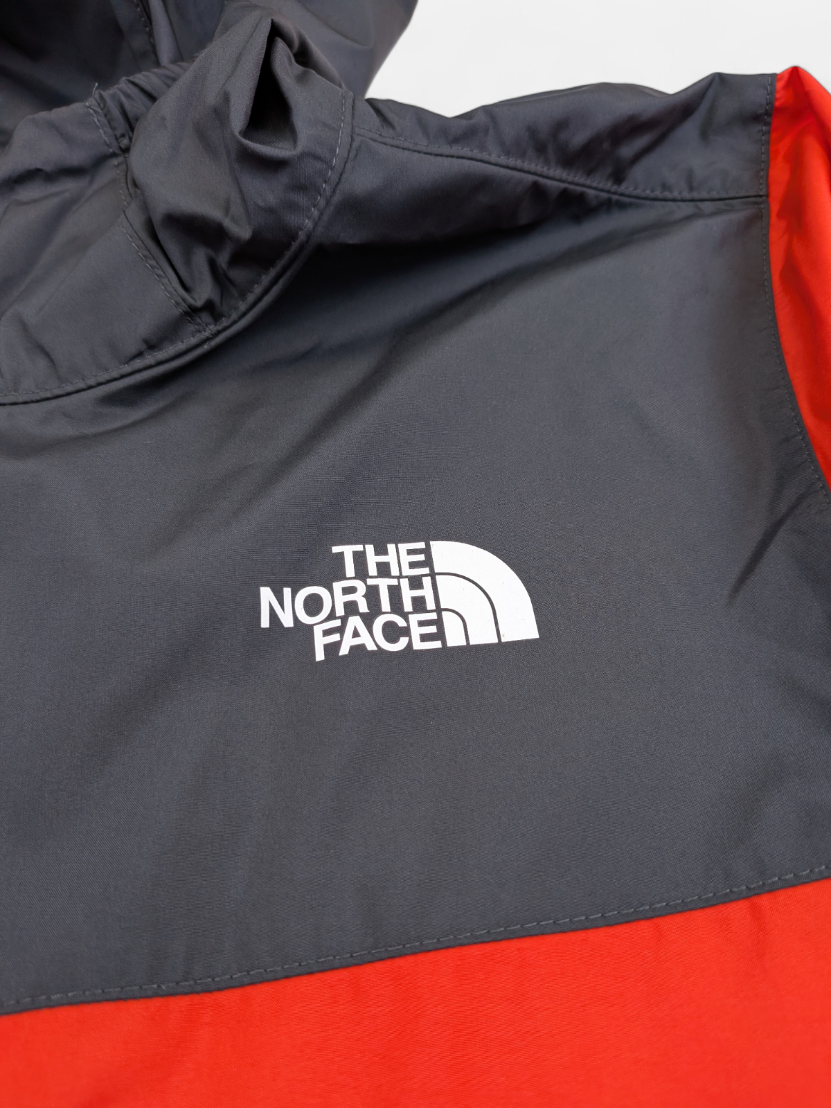 The North Face Kids React Wind Jacket / Fiery Red / RRP £50