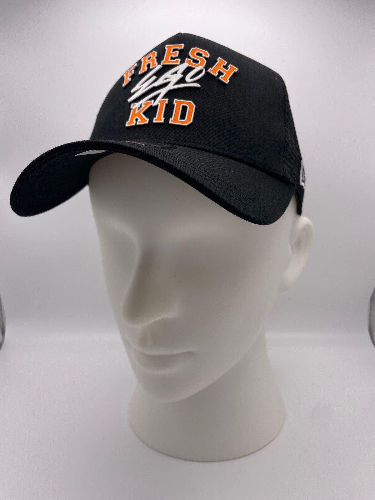 Fresh Ego Kid New Era Varsity Trucker Snapback Hat / Black Orange / RRP £35
